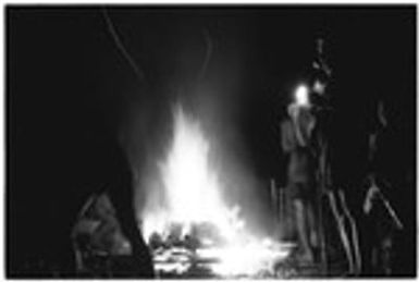 People around fire