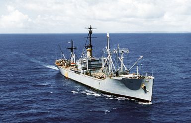 A starboard bow view of the cargo ship USNS FURMAN (T-AK-280) underway off the coast of Guam