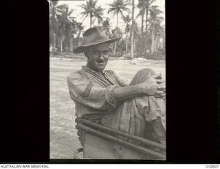 MOMOTE, LOS NEGROS ISLAND, ADMIRALTY ISLANDS. 1944-03-18. CORPORAL K. "OLEO" JOHNSON OF PETERSHAM, NSW, A FITTER WITH NO. 76 (KITTYHAWK) SQUADRON RAAF