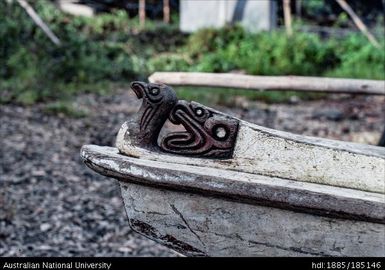 Carved canoe prow showing frigate bird decoration