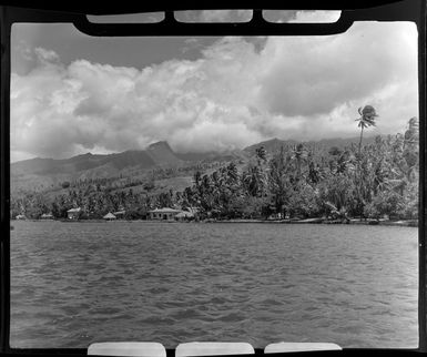 Tropique Hotel, Tahiti, showing the lagoon, huts and palm trees