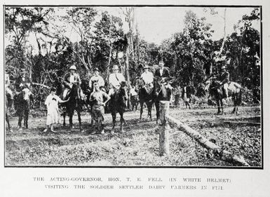 The Acting-Governor, Hon T. E. Fell (in white helmet) visiting the soldier settler dairy farmers in Fiji