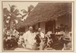 Hon C H Mills presenting New Zealand Ensign, Niue