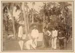 Hon C H Mills planting coconut-tree, Niue