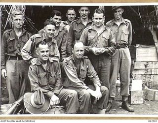 RAMU VALLEY, NEW GUINEA. 1944-01-16. PERSONNEL OF NO. 6 PLATOON, HEADQUARTERS COMPANY, 57/60TH INFANTRY BATTALION. THEY ARE: VX104114 CHAPLAIN G. T. SAMBELL (1); PRIVATE L. J. BRETHERTON (2); ..