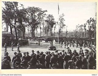 DALLMAN HARBOUR, NEW GUINEA. 1945-11-04. TROOPS OF 2/3 INFANTRY BATTALION, ATTENDING A MEMORIAL SERVICE OF THANKSGIVING FOR VICTORY AND REMEMBRANCE FOR MEMBERS OF THE UNIT WHO FELL IN THE ..