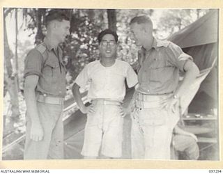 BUIN AREA, BOUGAINVILLE. 1945-09-28. MEMBERS OF 3 MILITARY HISTORY FIELD TEAM WITH A MEMBER OF A JAPANESE UNIT. THEY ARE ATTENDING THE FIRST OF A SERIES OF CONFERENCES AT THE HEADQUARTERS 2 CORPS ..