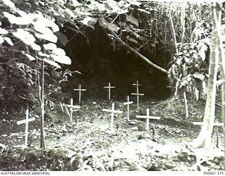 NEW BRITAIN, 1945-09. UNIDENTIFIED WAR GRAVES, PROBABLY JAPANESE, ON THE GAZELLE PENINSULA. (RNZAF OFFICIAL PHOTOGRAPH.)