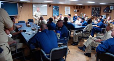 U.S. Navy L.Y. Spear Class Submarine Tender USS FRANK CABLE (AS 40) Command MASTER CHIEF Mark Fiorey meets with members of the ship's chief's mess on Dec. 15, 2006, discuss the status of Sailors who suffered severe steam burns during a Dec. 1 boiler explosion aboard the ship. Command MASTER CHIEF Fiorey recently returned from an eight-day visit with the Sailors and their families at Brooke Army Medical Center in San Annio, Texas. Of the six Sailors who were sent there for care, one has been released for out patient treatment and one passed away Dec. 8. The four remaining Sailors are in critical condition. The FRANK CABLE is forward deployed Guam in support of submarines deployed...