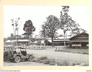 LAE, NEW GUINEA. 1945-04-08. THE EXTERIOR OF THE OTHER RANKS MESS, HEADQUARTERS FIRST ARMY, DURING THE VISIT OF SENATOR J.M. FRASER, ACTING MINISTER FOR THE ARMY, TO THE AREA