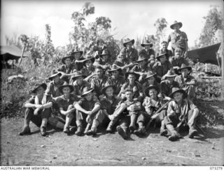 ALEXISHAFEN, NEW GUINEA. 1944-05-17. MEMBERS OF NO. 14 PLATOON, C COMPANY, 35TH INFANTRY BATTALION. A SECTION OF THE PLATOON HAS RECENTLY RETURNED FROM A PATROL WHICH CROSSED THE REMPI RIVER NORTH ..