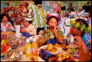 Children feasting at a Cook Islands hair-cutting ceremony