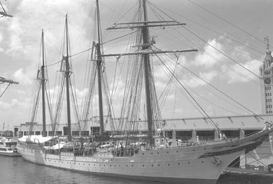 A starboard bow view of the Spanish navy's sail training ship Juan Sebastian De Elcano moored at a pier