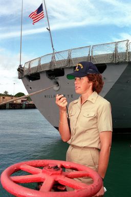 CHIEF Boatswain's Mate (BWC) Geraldine Morvay, Leading CHIEF PETTY Officer 1ST Division, speaks into the 1MC microphone during preparations to get the fleet oiler USS WILLIAMETTE (AO-180) underway