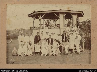 Group of adults and children at tennis court, Lautoka