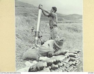 WANDOKAI, NEW GUINEA. 1944-04-17. MEMBERS OF THE 101ST BRIGADE SUPPORT COMPANY, FIRING A 4.2 INCH MORTAR DURING TESTS CONDUCTED BY THE OPERATIONAL RESEARCH SECTION, ATTACHED HEADQUARTERS NEW GUINEA ..