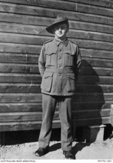 Informal outdoor portrait of NX66807 Private (Pte) Sydney Louis Nicholson, No. 1 Independent Company, of Merrylands, NSW. Pte Nicholson enlisted on 7 January 1941 and and served on the island of ..