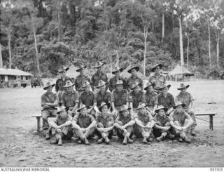 Group portrait of members of 11 Platoon, B Company, 58/59 Infantry Battalion. Identified, back row, left to right: Private (Pte) Reynolds; Pte Evans; Pte Smith; Pte Turner; Pte Richardson; Pte ..