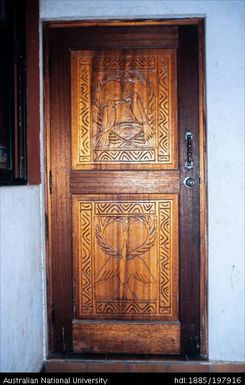 French Polynesia - Church wooden door, engraved with bird designs