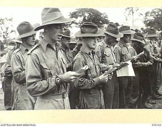 DUMPU, NEW GUINEA. 1944-02-06. TROOPS ATTENDING THE DEDICATION SERVICE AT THE DUMPU WAR CEMETERY