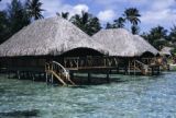 French Polynesia, overwater cabins on shore of Bora Bora