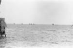 Canoe fleet on the lagoon. The outer islets can be seen in the background