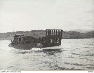 JACQUINOT BAY, NEW BRITAIN. 1944-12-01. 8-08 THE COURIER BARGE OF B COMPANY, 594TH ENGINEER BOAT AND SHORE REGIMENT, UNITED STATES ARMY, MOVING UP THE COAST ON ITS TWICE DAILY RUN