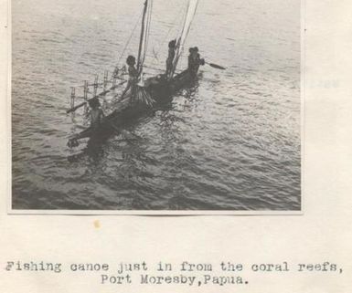 Fishing canoe just in from the coral reefs, Port Moresby, Papua New Guinea.