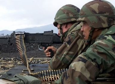 US Marines from 2nd Battalion, 3rd Marines, Weapons Company, fire an 240G during a training exercise at Pohakuloa Training area on the Big Island of Hawaii