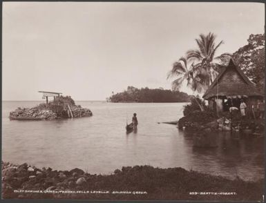 Local people at the gamal and islet shrine of Tendao, Vella Lavella, Solomon Islands, 1906 / J.W. Beattie