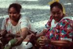 Grating ingredients for vaihu tamoko for fakanoanoa (evening mourning gathering)