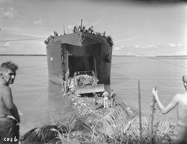 World War II vehicles, equipment, and troops landing on Nissan Island, Papua New Guinea