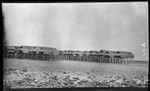 Stilted houses over water in a Motu village