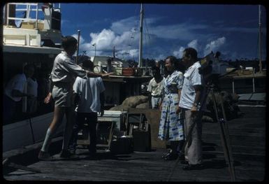 During the making of a film on malaria control, embarking at the wharf, with Ray Carlaw (Health Education Officer) (2) : Rabaul, New Britain, Papua New Guinea, 1960-1961 / Terence and Margaret Spencer