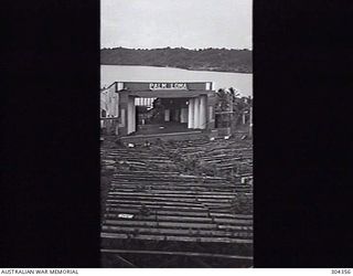 LOMBRUN POINT. ADMIRALTY ISLANDS. 1947-07. THE PALM LOMA PICTURE THEATRE. NOW DERELICT, IT IS BEING RECLAIMED BY JUNGLE GROWTH. (NAVAL HISTORICAL COLLECTION)