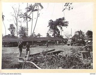 TUNNEL HILL ROAD, RABAUL, NEW BRITAIN. 1945-09-20. A GENERAL VIEW OF THE QUARTERMASTER AREA, 22 INFANTRY BATTALION. FOLLOWING THE SURRENDER OF THE JAPANESE TROOPS OF 4 INFANTRY BRIGADE NOW OCCUPY ..