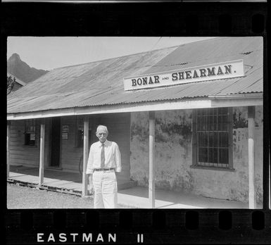 Close-up view of the Bonar and Shearman store front with an unidentified older man, Rarotonga, Cook Islands