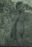 Iuri boy, bone dagger and tobacco in ear, Green River patrol, [Papua New Guinea], 1954
