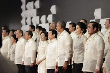 Barack Obama joins Asia Pacific Economic Cooperation Summit leaders and spouses for a group photo in Pasay, Metro Manila, Philippines, November 18, 2015