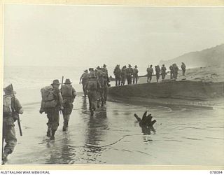 DANMAP RIVER AREA, NEW GUINEA. 1944-12-28. A PATROL FROM NO.7 PLATOON, A COMPANY, 2/11TH INFANTRY BATTALION SETTING OUT FROM THE UNIT CAMP AREA TO RELIEVE A UNIT OUTPOST. IDENTIFIED PERSONNEL IS:- ..