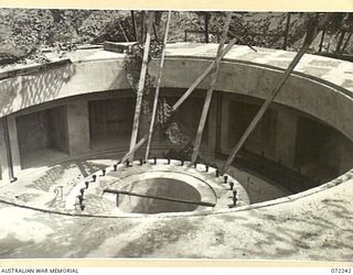 PORT MORESBY, NEW GUINEA. 1944-04-15. THE BASILISK BATTERY, FORMS PART OF THE PORT MORESBY ANTI-AIRCRAFT COASTAL DEFENCE USING 5.25 INCH COASTAL ARTILLERY. THE COMPLETED GUN PIT CONSTRUCTED BY THE ..