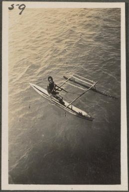Papuan man in a canoe, New Britain Island, Papua New Guinea, approximately 1916
