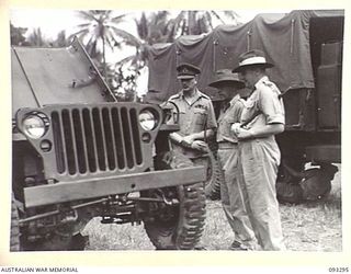 NADZAB AREA, NEW GUINEA, 1945-06-27. HIS ROYAL HIGHNESS, THE DUKE OF GLOUCESTER, GOVERNOR GENERAL OF AUSTRALIA (1) INSPECTING A JEEP AT THE LAND HEADQUARTERS SCHOOL OF MECHANICS, FIRST ARMY ..