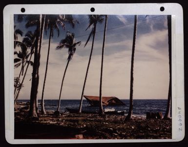 Disabled Jap Ship Off The Shore At Munda, New Georgia, In The Solomon Islands. (U.S. Air Force Number K4982)