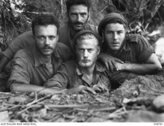 DUMPU, NEW GUINEA. 1943-10-07. MEMBERS OF THE 2/2ND AUSTRALIAN INDEPENDENT COMPANY, ON THEIR RETURN TO CAMP, AFTER A TWELVE DAY PATROL IN THE RAMU VALLEY. LEFT TO RIGHT:- NX37195 TROOPER (TPR) F. ..