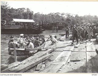 LAE, NEW GUINEA. 1944-08-18. LIFEBOATS LOADED WITH PATIENTS FROM THE 2/7TH GENERAL HOSPITAL READY TO MOVE OUT TO THE 2/1ST HOSPITAL SHIP, "MANUNDA" WHICH IS MOORED IN THE STREAM SOME DISTANCE FROM ..