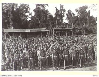 TOROKINA, BOUGAINVILLE. 1945-10-03. A CONGREGATION OF HEADQUARTERS 3 DIVISION TROOPS AT GLOUCESTER PARK OVAL ATTENDING THE SOLEMN HIGH MASS OF THANKSGIVING FOR PEACE