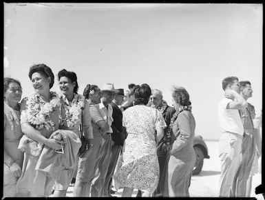 Passengers about to embark on Dakota aircraft, Aitutaki