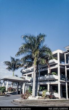 Fiji - white hotel apartments with curved balconies and black railings