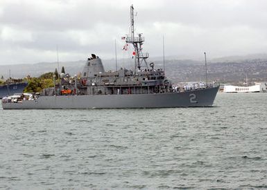 The US Navy (USN) Avenger Class Mine Countermeasures Ship USS DEFENDER (MCM 2) arrives in Pearl Harbor following her deployment in support of operations and exercises in the Pacific Ocean